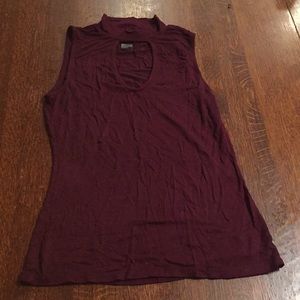 A tank top with a chocker neck line